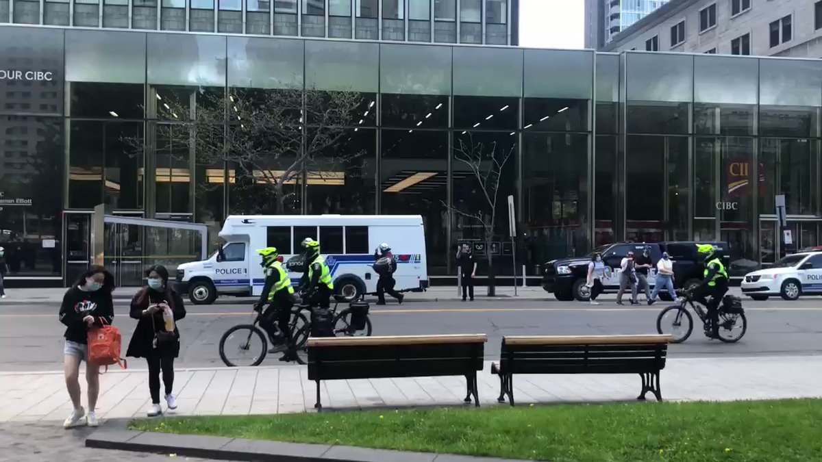 The Palestine counter-protest breaks the police line trying to advance towards the Pro-Israel rally.  One person from the Palestine side appears to be apprehended, while another takes the police on a chase.   