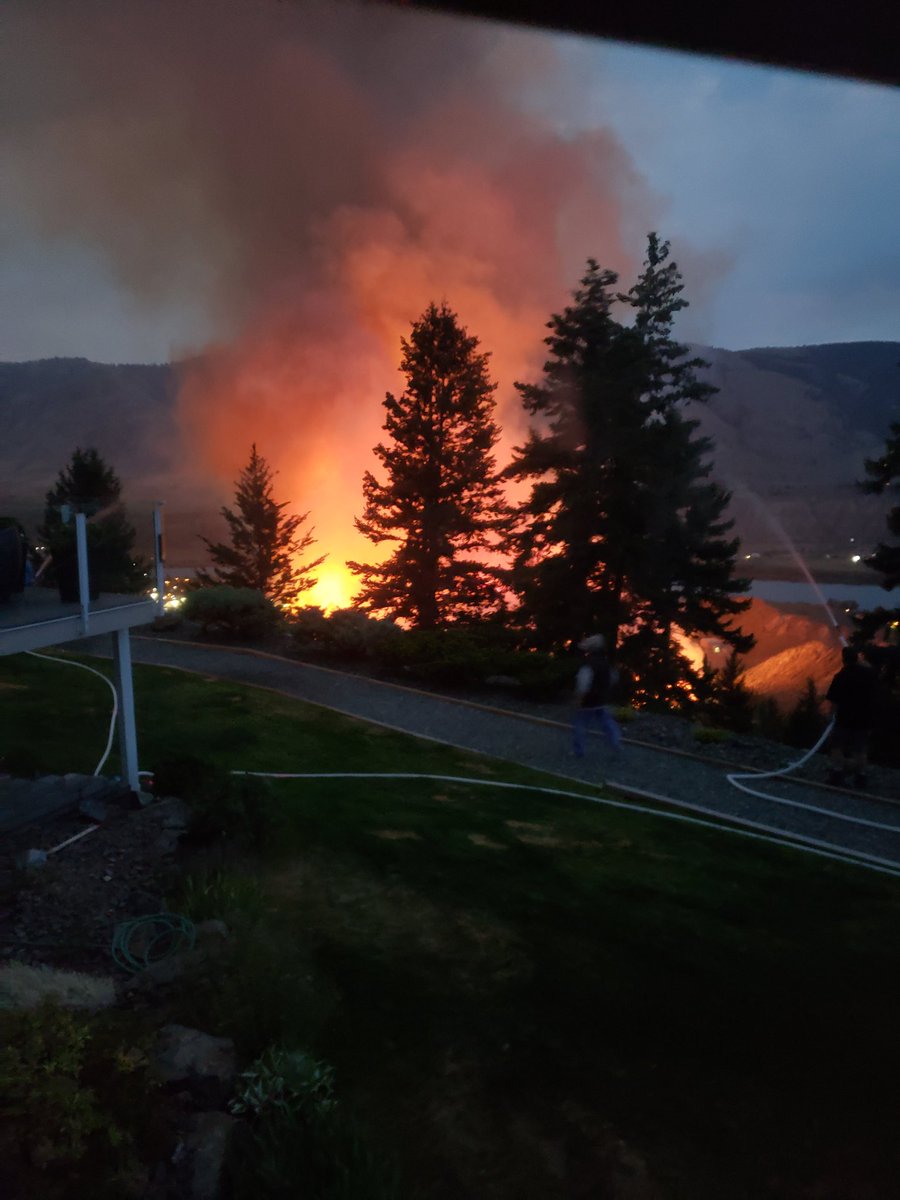 This was taken 10 mins ago from my moms dining room in Juniper Ridge. Lightning strike.  