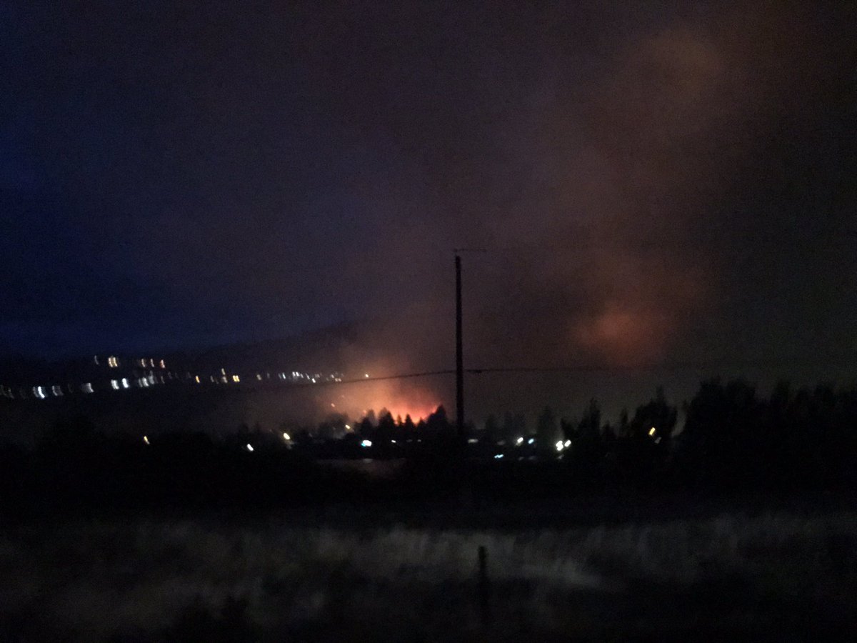 Still seeing flames but it has died down with the help of the rain closer to Valleyview, can't see what it's doing higher up the hill from this viewpoint