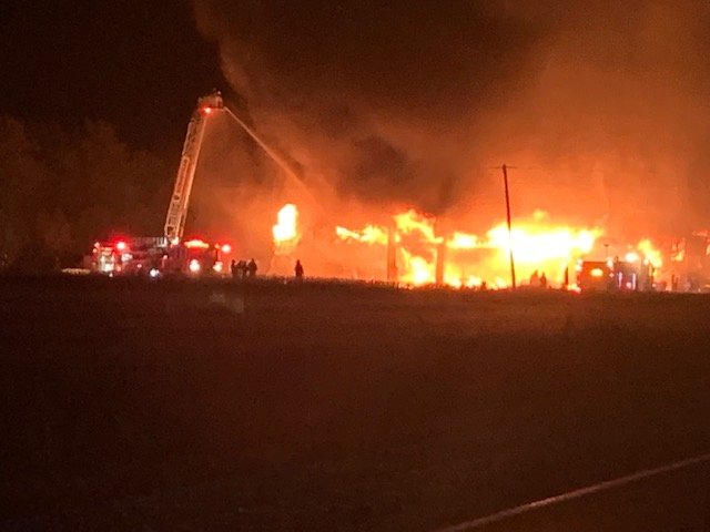 Emergency crews on scene of fire at business on County Road 23 and Road 8 West in Kingsville. 23 is closed.