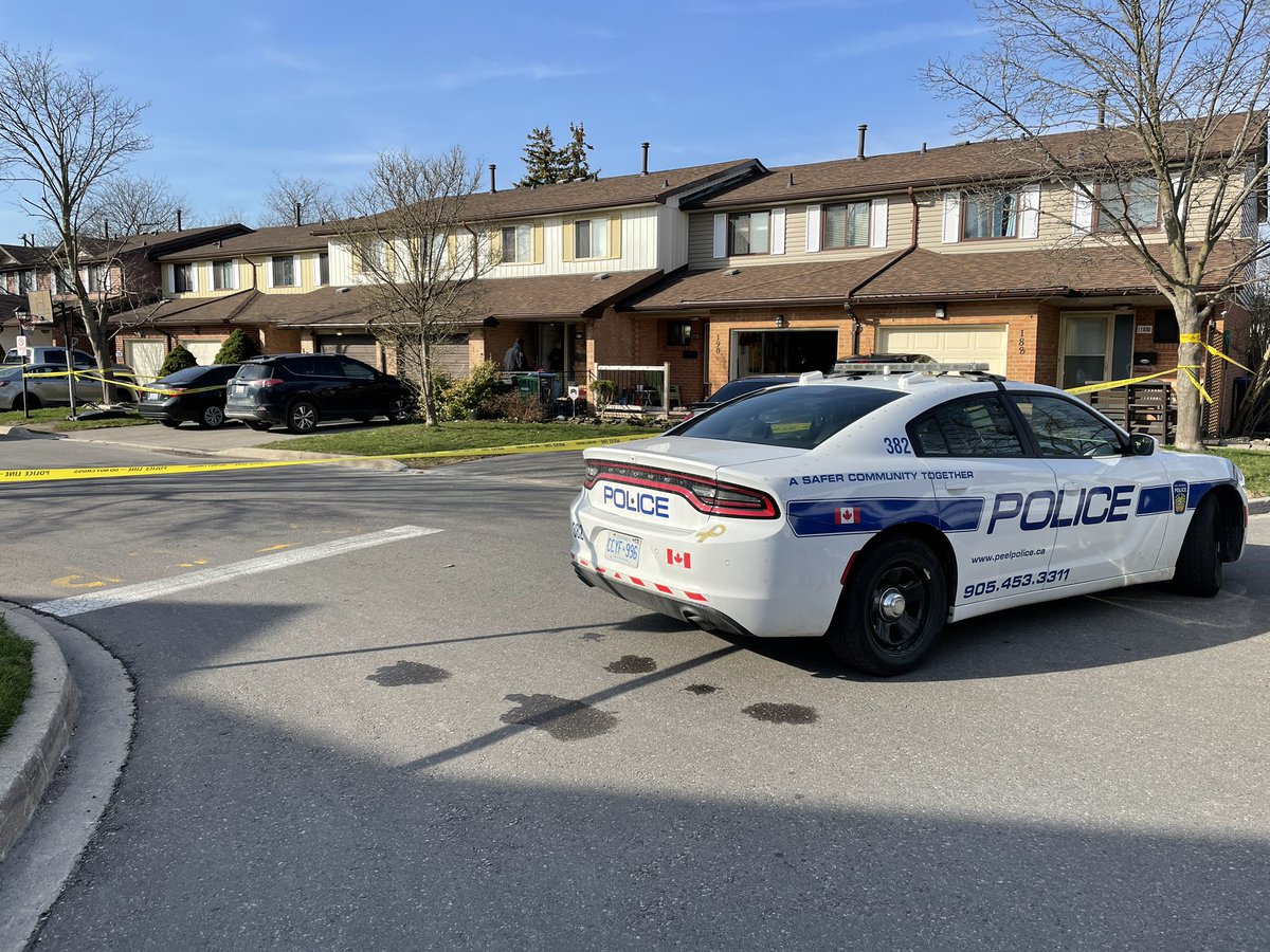 Police on scene after a shooting at a townhouse in Brampton