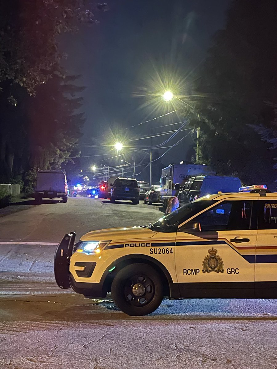 Active scene on 128 A St. in Surrey off 100th ave. Police responding to a shooting. Heard two flash bangs. Heavy police presence. One man being treated in hospital with non-life threatening injuries. Road closed to public