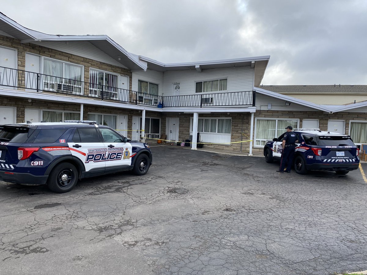 Investigators and police remain on scene for a shooting investigation at the Weber Inn in Kitchener. Police have taped off the northeast corner and a blood trail can be seen going from Weber St E into the Inn parking lot