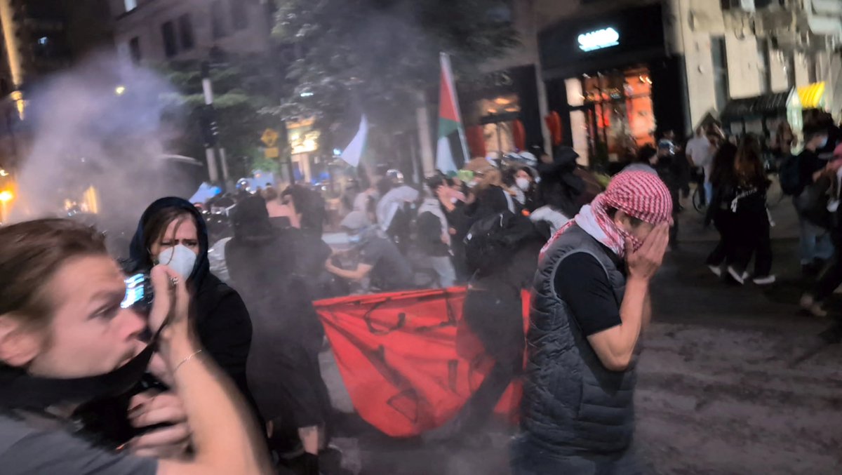 Police clash with protesters during a rally in support of Palestinians in Gaza and the occupied West Bank, in Montreal, Canada. 